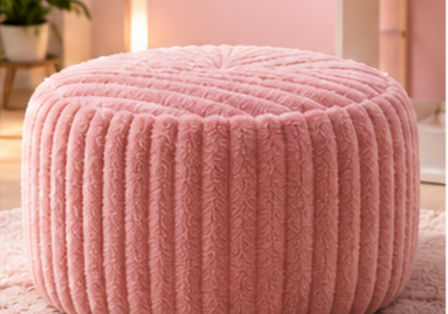 Pink plush textured round pouf ottoman
